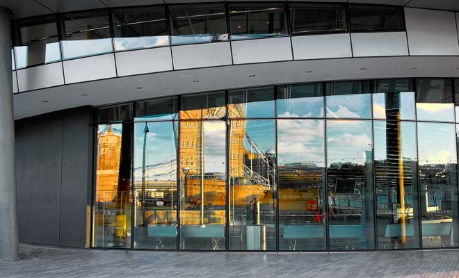 Reflections of Tower Bridge, River Thames, London